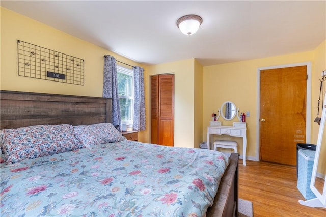 529 Fetzner Rd, Greece, NY 14626 - bedroom featuring a closet and light wood-style floors
