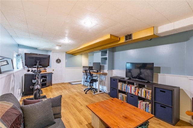 529 Fetzner Rd, Greece, NY 14626 - living area featuring wainscoting, an office area, and wood finished floors