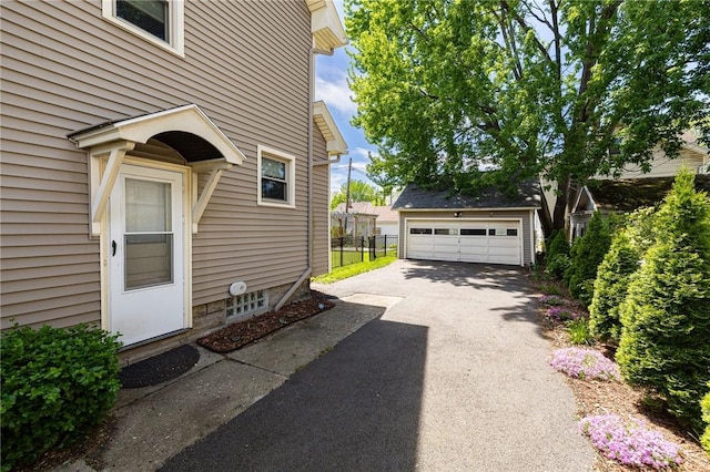 1043 Genesee Park Blvd, Rochester, NY 14619 - view of property exterior with a garage and an outdoor structure