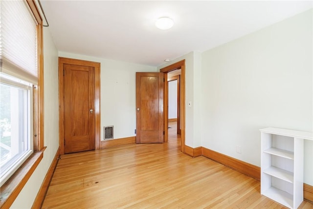 1043 Genesee Park Blvd, Rochester, NY 14619 - spare room with light wood-style flooring and baseboards