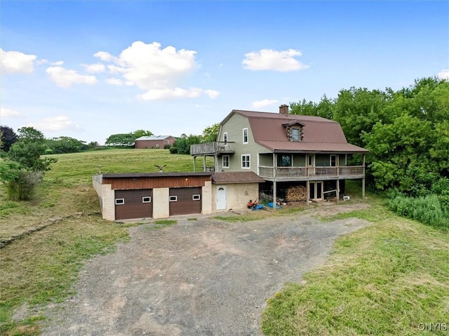 5640 Fearon Rd, Eaton, NY 13408 - view of front of house featuring a gambrel roof, dirt driveway, an outbuilding, a chimney, and a deck