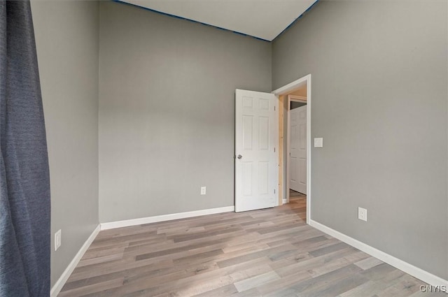 5640 Fearon Rd, Eaton, NY 13408 - empty room with wood finished floors and a towering ceiling