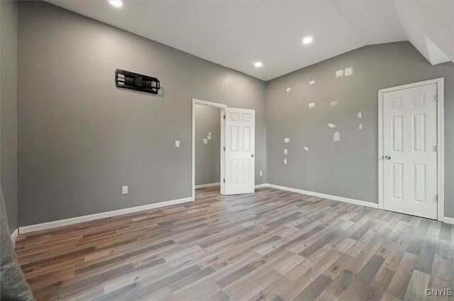 5640 Fearon Rd, Eaton, NY 13408 - unfurnished bedroom featuring light wood finished floors, lofted ceiling, and recessed lighting