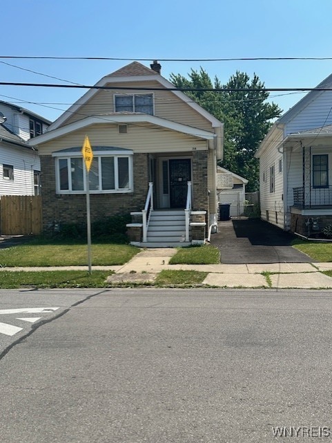 79 Courtland Ave, Buffalo, NY 14215 - bungalow-style house featuring an outbuilding
