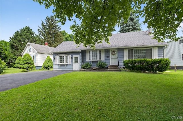 7165 Manlius Center Rd, Manlius, NY 13057 - single story home featuring a front yard and driveway
