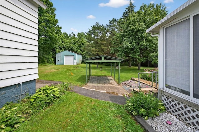 7165 Manlius Center Rd, Manlius, NY 13057 - view of green lawn featuring an outdoor structure, a gazebo, and view of wooded area