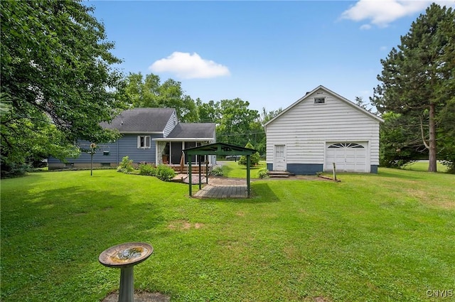 7165 Manlius Center Rd, Manlius, NY 13057 - rear view of house featuring a gazebo, crawl space, a yard, a garage, and a deck