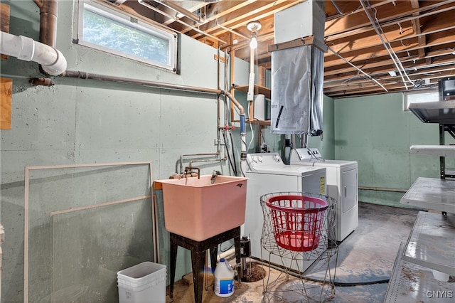 7165 Manlius Center Rd, Manlius, NY 13057 - basement featuring independent washer and dryer and a sink