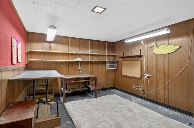 7165 Manlius Center Rd, Manlius, NY 13057 - misc room featuring wood walls and concrete floors