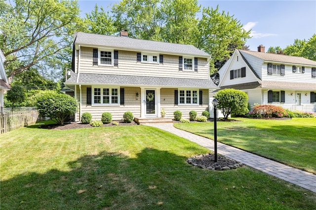 36 Dover Park, Brighton, NY 14610 - traditional-style house with a chimney and roof with shingles