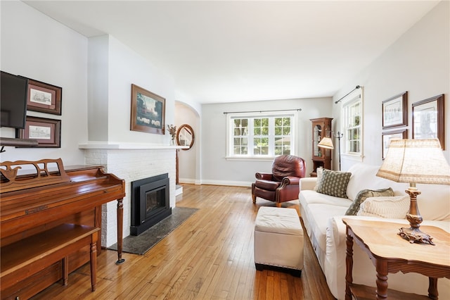 36 Dover Park, Brighton, NY 14610 - living room with light wood-type flooring and a brick fireplace