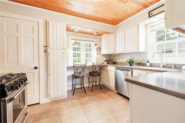 36 Dover Park, Brighton, NY 14610 - kitchen with wood ceiling, stainless steel appliances, light tile patterned floors, tasteful backsplash, and white cabinetry
