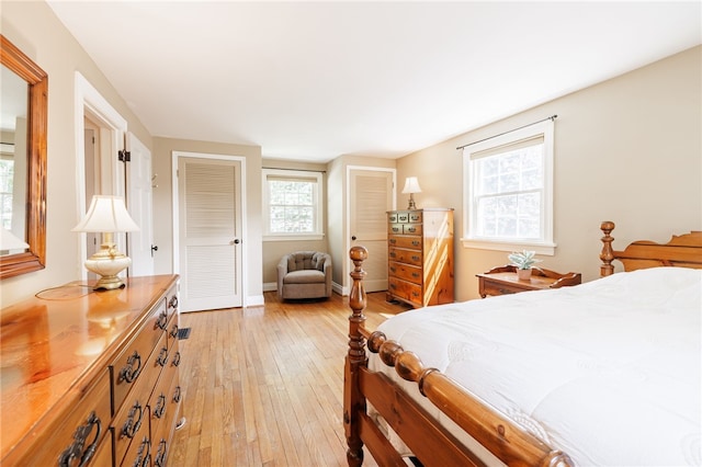 36 Dover Park, Brighton, NY 14610 - bedroom with light wood-style flooring and multiple closets