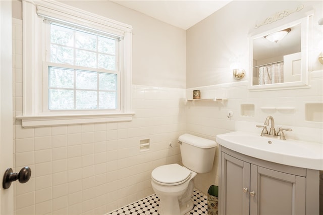 36 Dover Park, Brighton, NY 14610 - full bathroom featuring vanity, tile walls, and a wainscoted wall