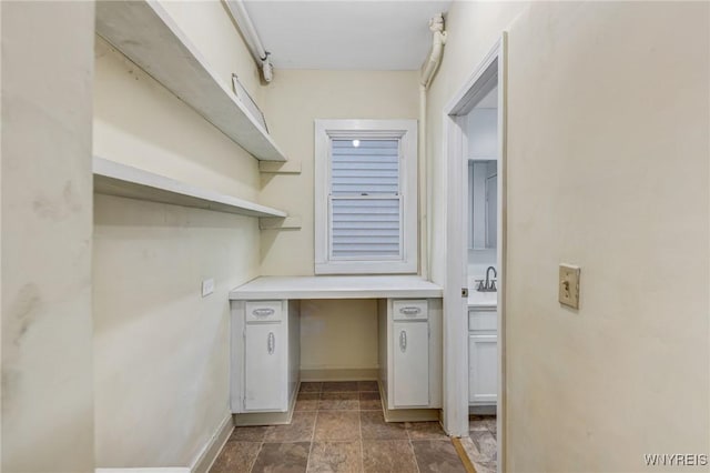 386 Davey St, Buffalo, NY 14206 - washroom featuring baseboards and a sink