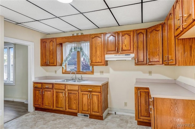 386 Davey St, Buffalo, NY 14206 - kitchen with brown cabinetry and light countertops