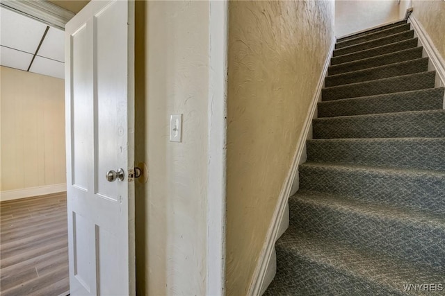 386 Davey St, Buffalo, NY 14206 - staircase with wood finished floors and baseboards