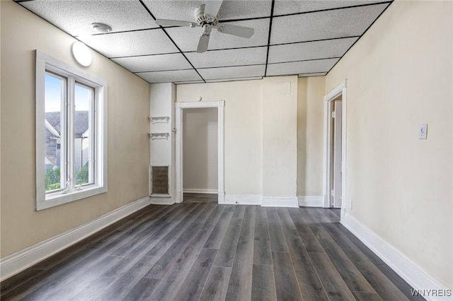 386 Davey St, Buffalo, NY 14206 - unfurnished room with plenty of natural light, dark wood-style floors, a paneled ceiling, and a ceiling fan
