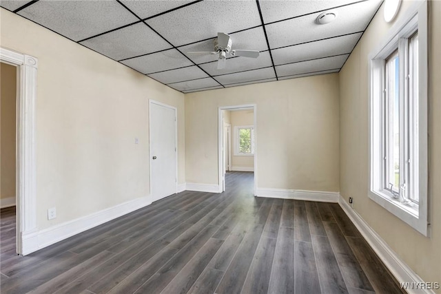 386 Davey St, Buffalo, NY 14206 - empty room featuring a drop ceiling, dark wood finished floors, and ceiling fan