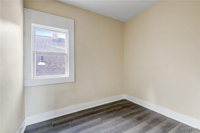 386 Davey St, Buffalo, NY 14206 - spare room featuring dark wood-type flooring and baseboards