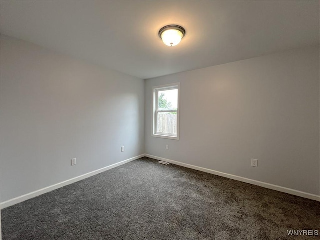 155 Barnsdale Ave, West Seneca, NY 14224 - spare room featuring dark carpet and baseboards