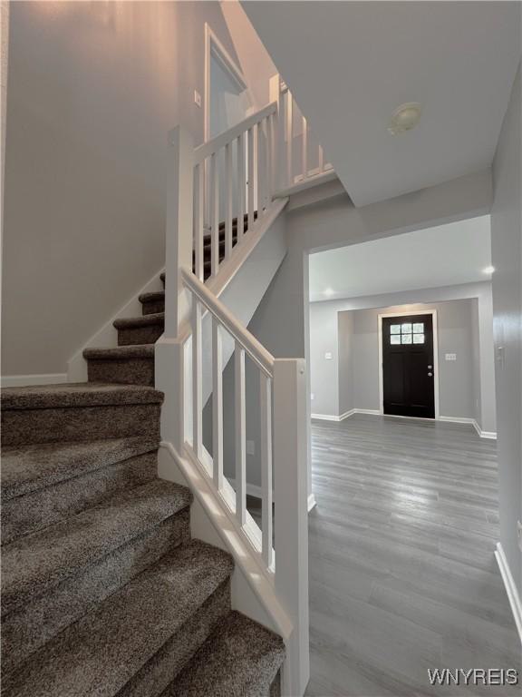 155 Barnsdale Ave, West Seneca, NY 14224 - stairs with baseboards and wood finished floors