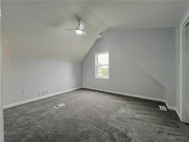 155 Barnsdale Ave, West Seneca, NY 14224 - additional living space featuring a ceiling fan, dark carpet, and vaulted ceiling