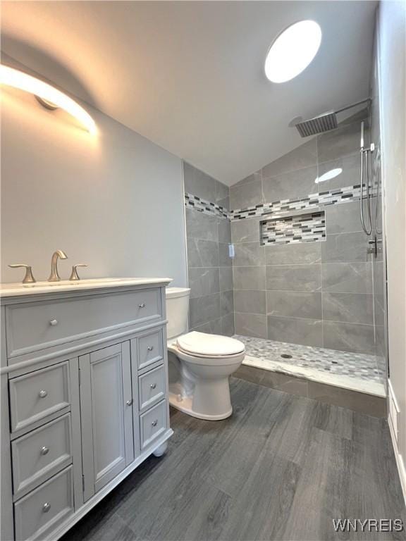 155 Barnsdale Ave, West Seneca, NY 14224 - full bath featuring lofted ceiling, wood finished floors, a tile shower, and vanity