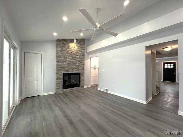 155 Barnsdale Ave, West Seneca, NY 14224 - unfurnished living room featuring ceiling fan, dark wood-style flooring, a fireplace, vaulted ceiling, and recessed lighting