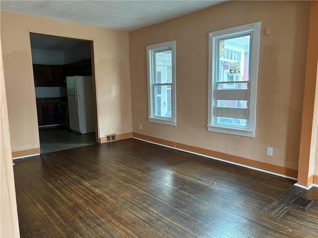 38 Cedar St, Rochester, NY 14611 - unfurnished room with dark wood-style flooring