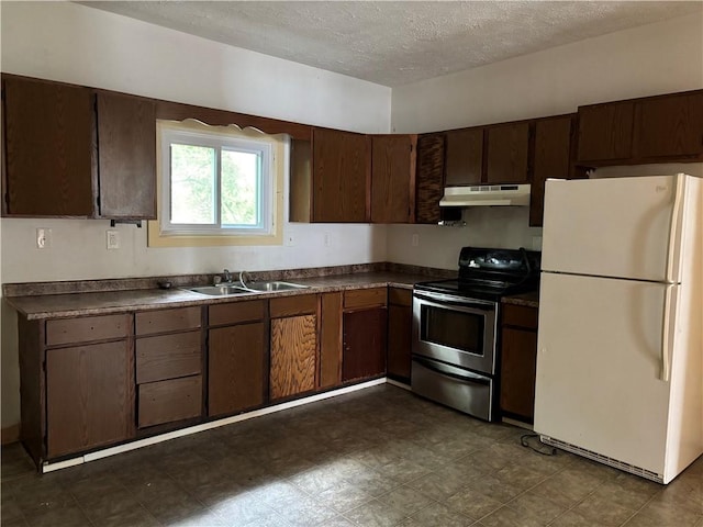 38 Cedar St, Rochester, NY 14611 - kitchen with freestanding refrigerator, stainless steel electric range, dark countertops, a textured ceiling, and under cabinet range hood