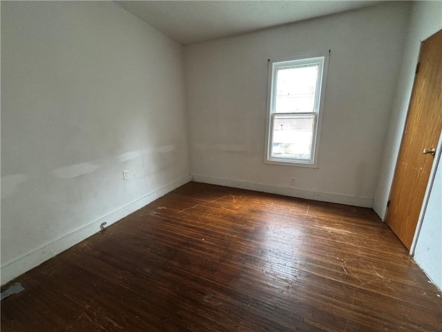 38 Cedar St, Rochester, NY 14611 - spare room featuring hardwood / wood-style floors and baseboards