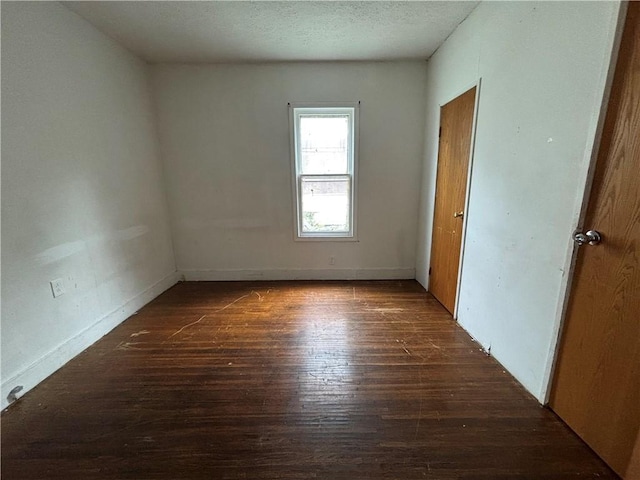 38 Cedar St, Rochester, NY 14611 - unfurnished room with dark wood-style floors