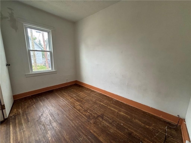 38 Cedar St, Rochester, NY 14611 - empty room featuring wood finished floors and a textured ceiling