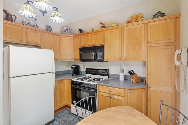 315 Boyden St, Syracuse, NY 13203 - kitchen featuring freestanding refrigerator, range with gas stovetop, black microwave, and light countertops