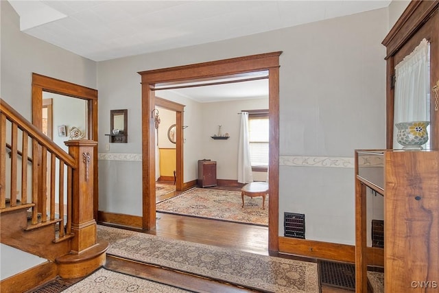 315 Boyden St, Syracuse, NY 13203 - entrance foyer with wood finished floors and stairs