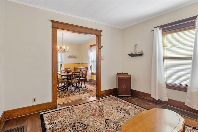 315 Boyden St, Syracuse, NY 13203 - sitting room featuring hardwood / wood-style floors, a chandelier, and crown molding