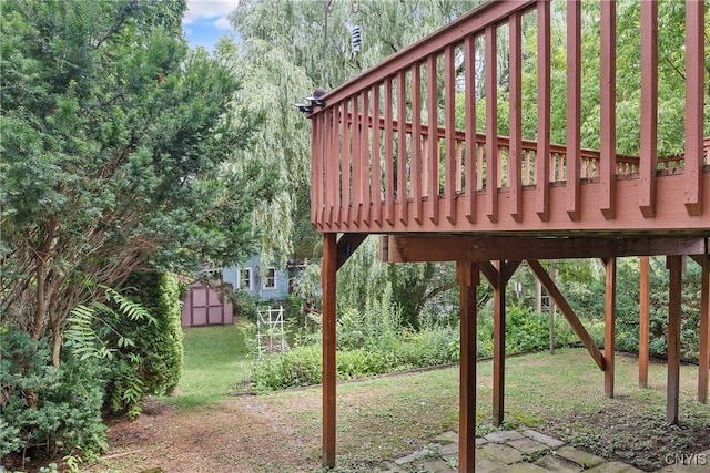 315 Boyden St, Syracuse, NY 13203 - view of grassy yard with a storage unit and a deck