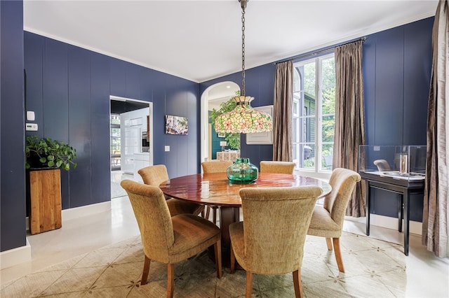 3399 Elmwood Ave, Brighton, NY 14610 - dining space featuring a decorative wall and arched walkways