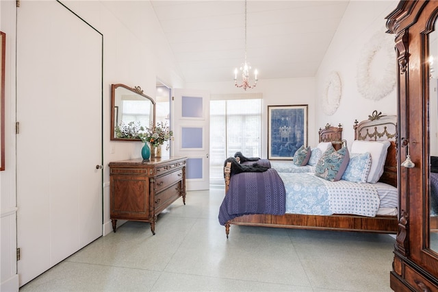 3399 Elmwood Ave, Brighton, NY 14610 - bedroom featuring a chandelier, lofted ceiling, and dark aggregate flooring