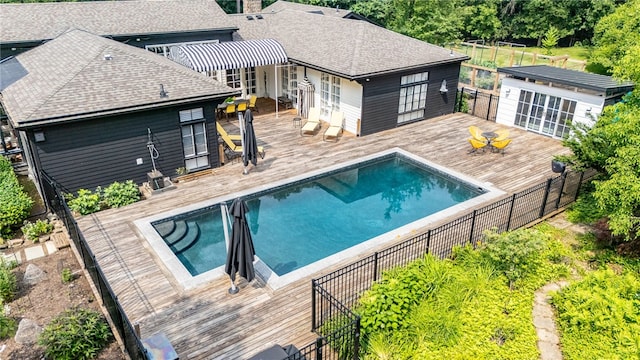 3399 Elmwood Ave, Brighton, NY 14610 - view of pool featuring a wooden deck and french doors