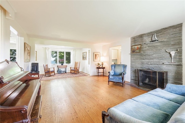 760 Beach Ave, Rochester, NY 14612 - living room featuring wood finished floors and a large fireplace
