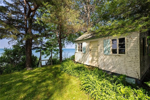 760 Beach Ave, Rochester, NY 14612 - view of side of home featuring a water view and a lawn