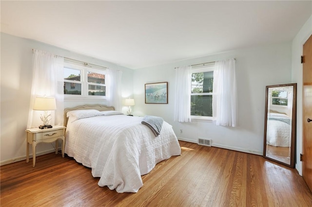 760 Beach Ave, Rochester, NY 14612 - bedroom featuring light wood-style flooring and baseboards