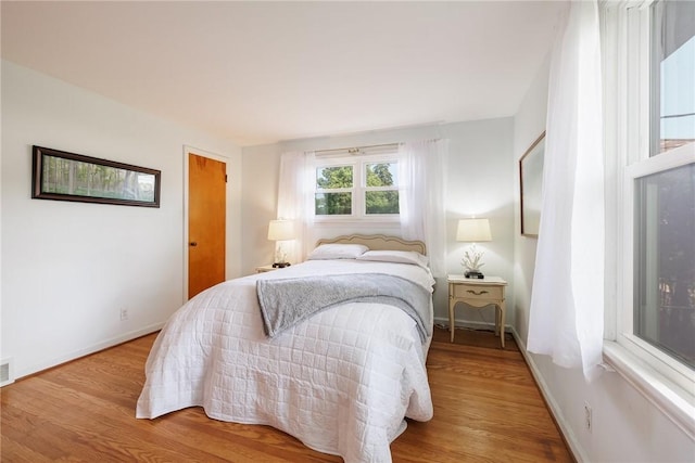 760 Beach Ave, Rochester, NY 14612 - bedroom featuring wood finished floors and baseboards