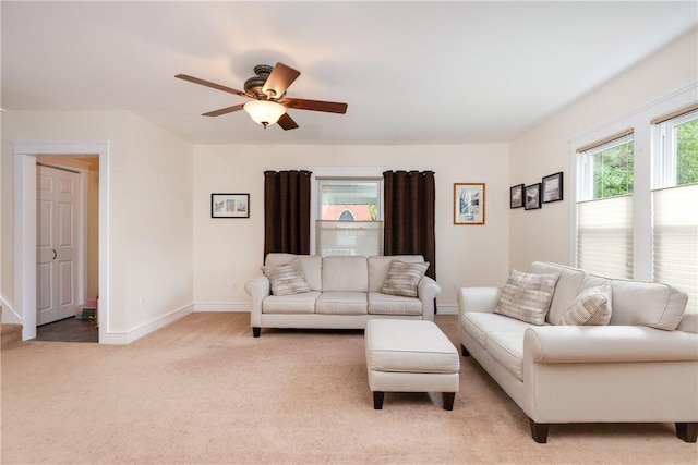 121 Reynolds Ave, Corning City, NY 14830 - living area featuring a ceiling fan and light carpet