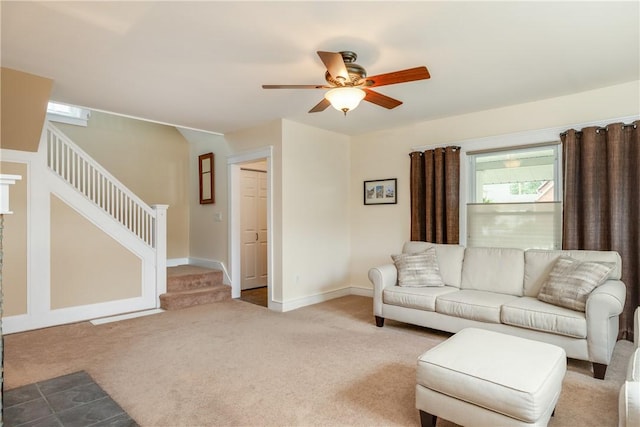 121 Reynolds Ave, Corning City, NY 14830 - carpeted living room with stairs and ceiling fan