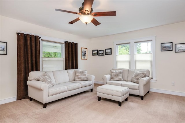 121 Reynolds Ave, Corning City, NY 14830 - living area featuring a ceiling fan and light carpet