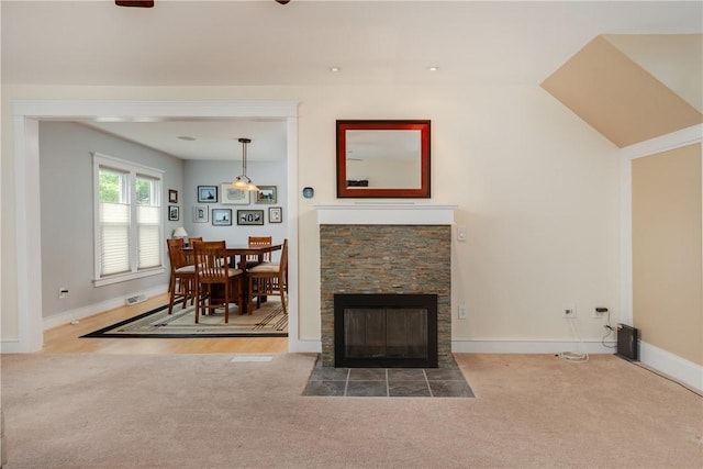 121 Reynolds Ave, Corning City, NY 14830 - carpeted living room featuring baseboards and a stone fireplace