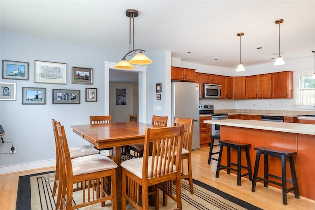 121 Reynolds Ave, Corning City, NY 14830 - dining room featuring light wood-style floors